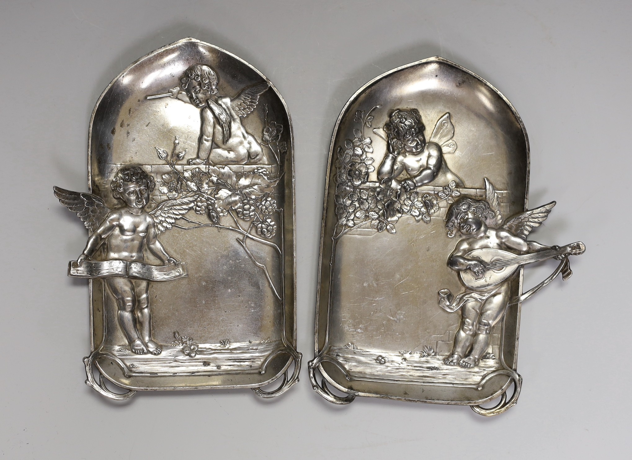 A pair of WMF style plaques, 22cm long